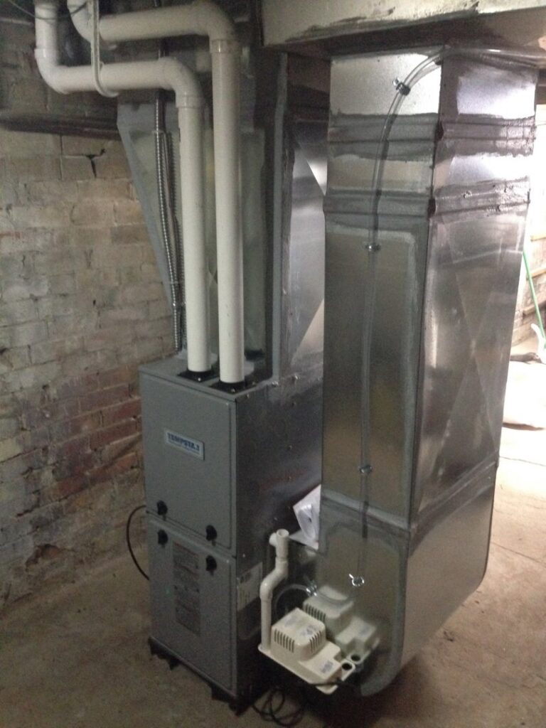 A new furnace and ductwork installation in a basement by R.J. Nelson Co in Council Bluffs, IA.