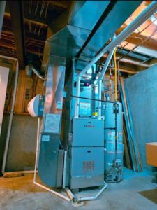 A complete furnace and water heater installation with ductwork by Cool y Caliente HVAC Services in Bonner Springs, KS.
