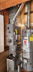 A professional installation of a new furnace and water heater by Nelke Mechanical in Keizer, OR.
