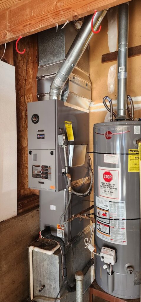 A professional installation of a new furnace and water heater by Nelke Mechanical in Keizer, OR.