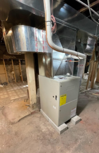 A newly installed furnace and ductwork system in a basement by JL Heating & AC LLC in Chicago, IL
