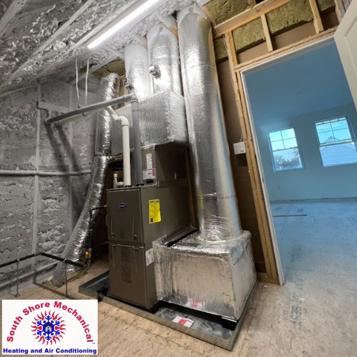 A new furnace and ductwork installation in a residential building by South Shore Mechanical in Abington, MA