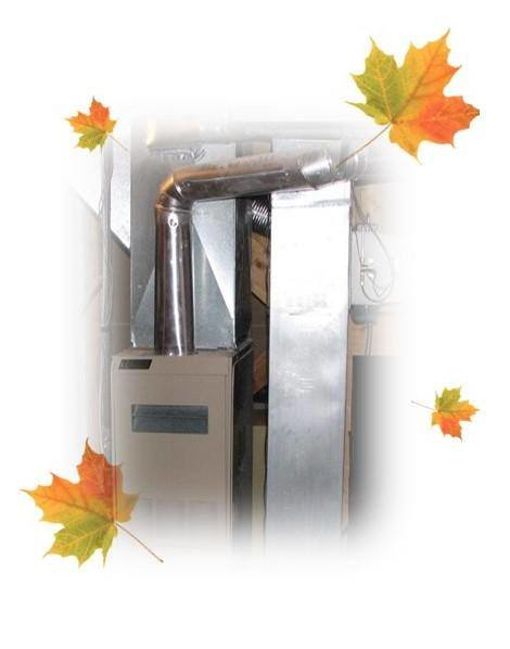 A modern furnace and heating unit with ductwork, representing HVAC services by Gary Hinderaker Plumbing Heating Air Conditioning, Inc. in Waverly, IA.