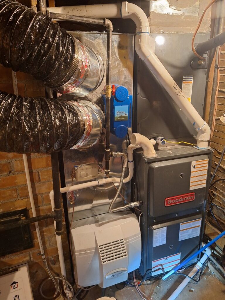 A newly installed Goodman furnace and humidifier with ductwork by Advanced Home Services in Rigby, ID.