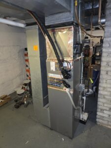 A complete furnace and ductwork installation in a basement by Cyber Heating and Cooling in Bloomington, MN.