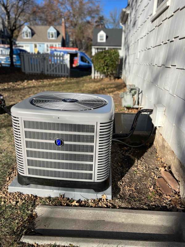 An indoor furnace unit installed in a tight closet space by A-1 HVAC in Kansas City, KS.