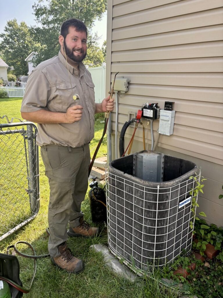 Internal components of a furnace exposed during an inspection by Polar Air Heating and Cooling in Omaha, NE