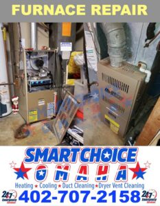 An open furnace unit undergoing repair or maintenance by Smart Choice Omaha Heating & Cooling in Papillion, NE.