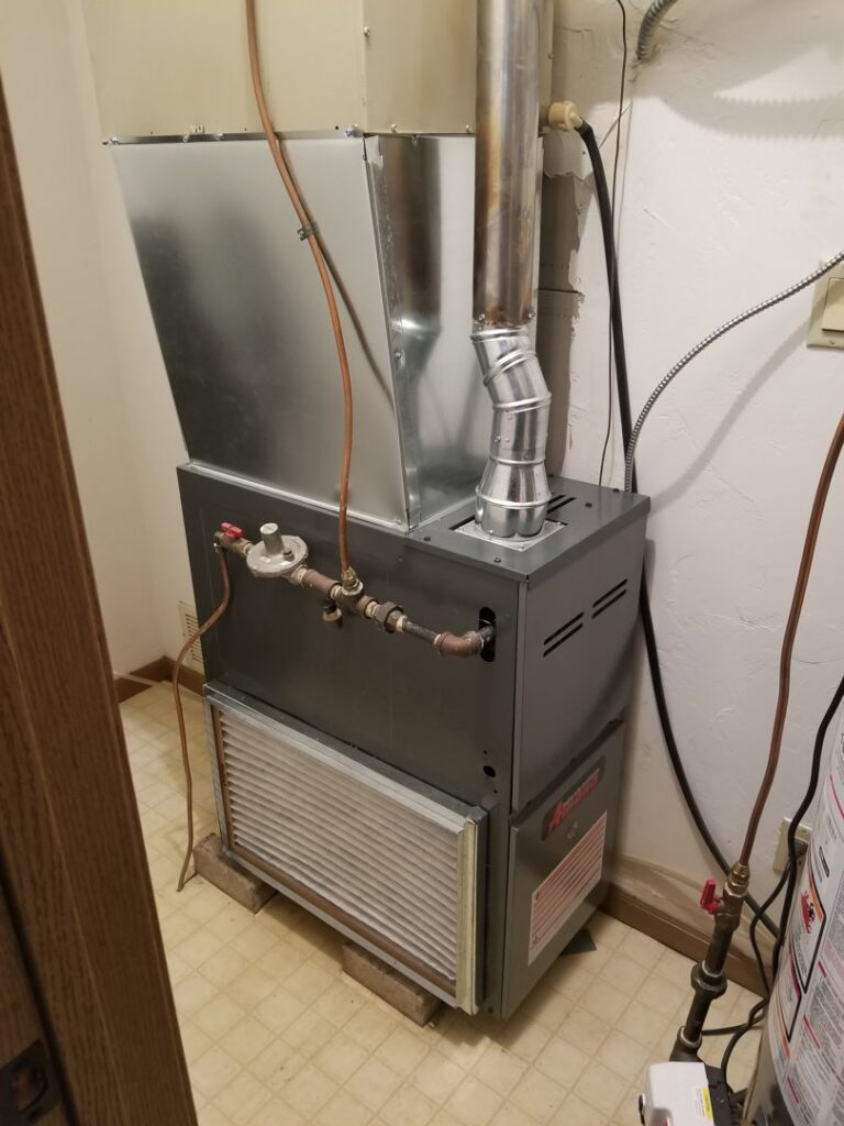 A new furnace and ductwork installation completed by 9-1-1 Heating & Air, LLC, offering reliable heating services in Milwaukee, WI.