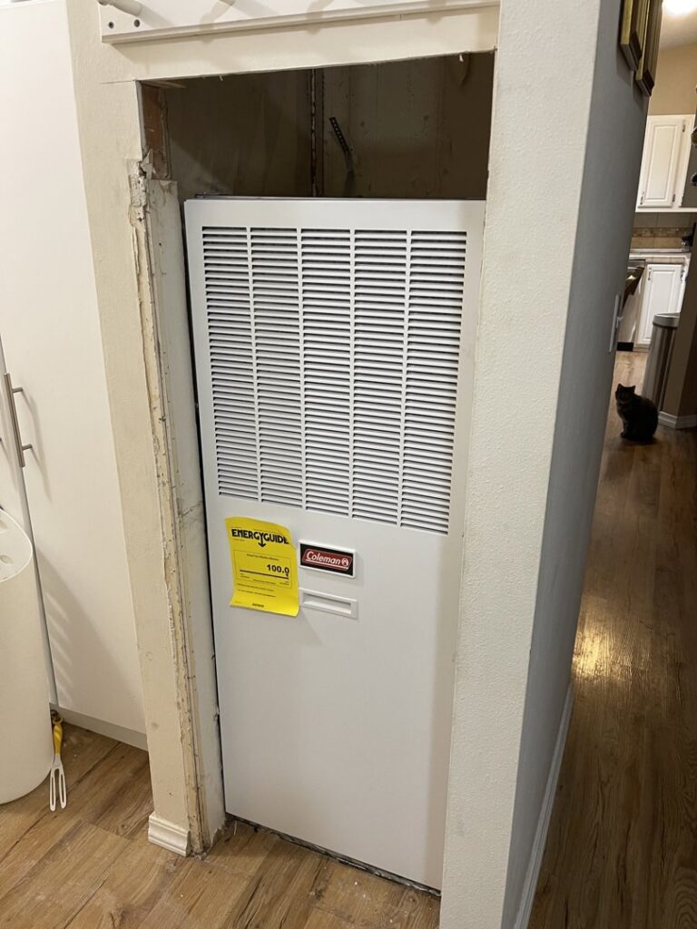A furnace unit installed in a utility closet by DiMartino's 5 Star Heating & Air Conditioning LLC in Salem, OR.