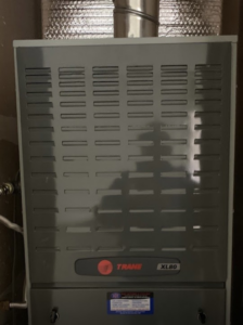 An indoor Trane XL80 furnace unit, ready for installation or service by A and R Air Conditioning & Heating furnace in San Jose, CA.