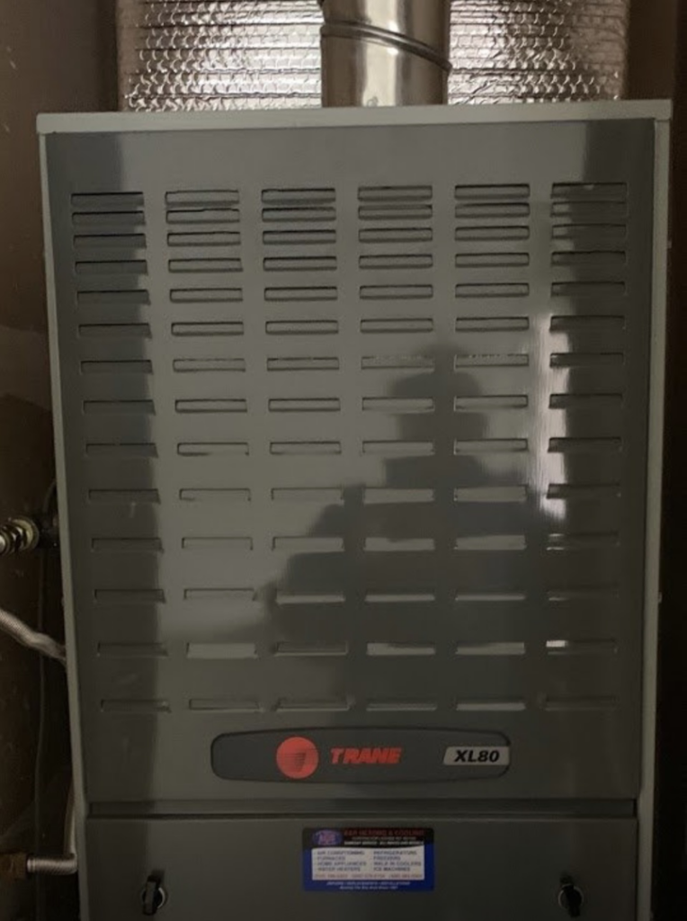 An indoor Trane XL80 furnace unit, ready for installation or service by A and R Air Conditioning & Heating furnace in San Jose, CA.