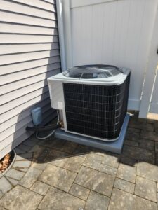A furnace, water heater, and Aprilaire humidifier installed by Riccardi Heating and Air, an HVAC contractor in Toms River, NJ.