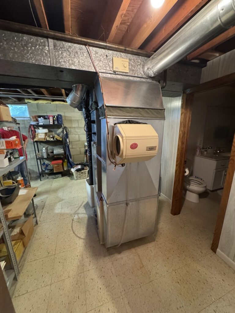 A furnace and air handler unit with an attached humidifier installed by HVAC KING LLC in Maple Grove, MN