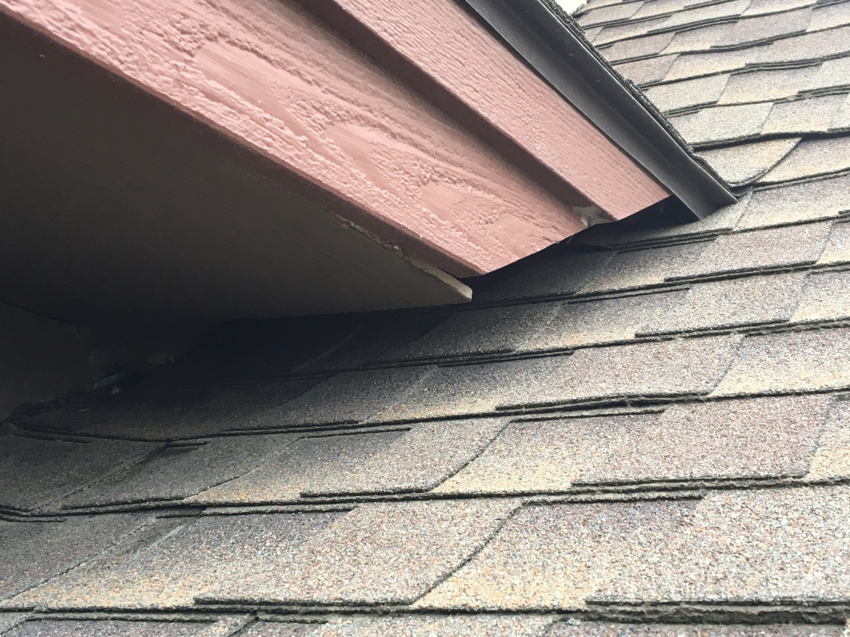 A gap under roof eaves, a potential entry point for bats, inspected by Idaho Bat Control in Meridian, ID