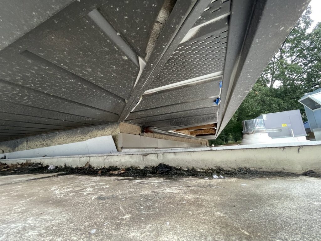 A gap under a roof overhang, indicating a potential wildlife entry point, inspected by The Squirrel Guys in Birmingham, AL.