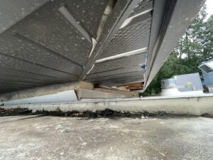 A gap under a roof overhang, indicating a potential wildlife entry point, inspected by The Squirrel Guys in Birmingham, AL.