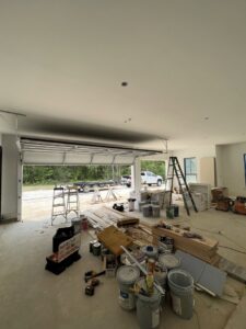 Garage door installation in a new construction site by Specialty Garage Door in Bossier City, LA