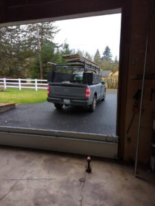 View from inside a garage during a garage door installation or repair by Babcock Garage Doors in Vancouver, WA