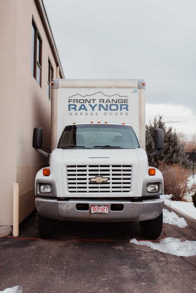 A garage door installation in progress by Front Range Raynor Garage Door & Service in Fort Collins, CO.