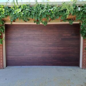 Interior view of a garage door showing the opener rail and top panel, installed by American Eagle Garage Doors in Greeley, CO.