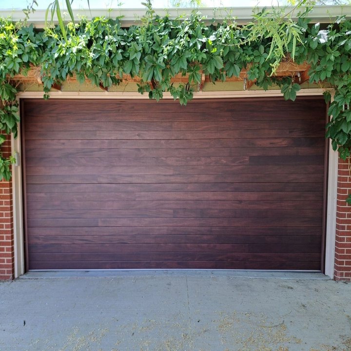 Interior view of a garage door showing the opener rail and top panel, installed by American Eagle Garage Doors in Greeley, CO.
