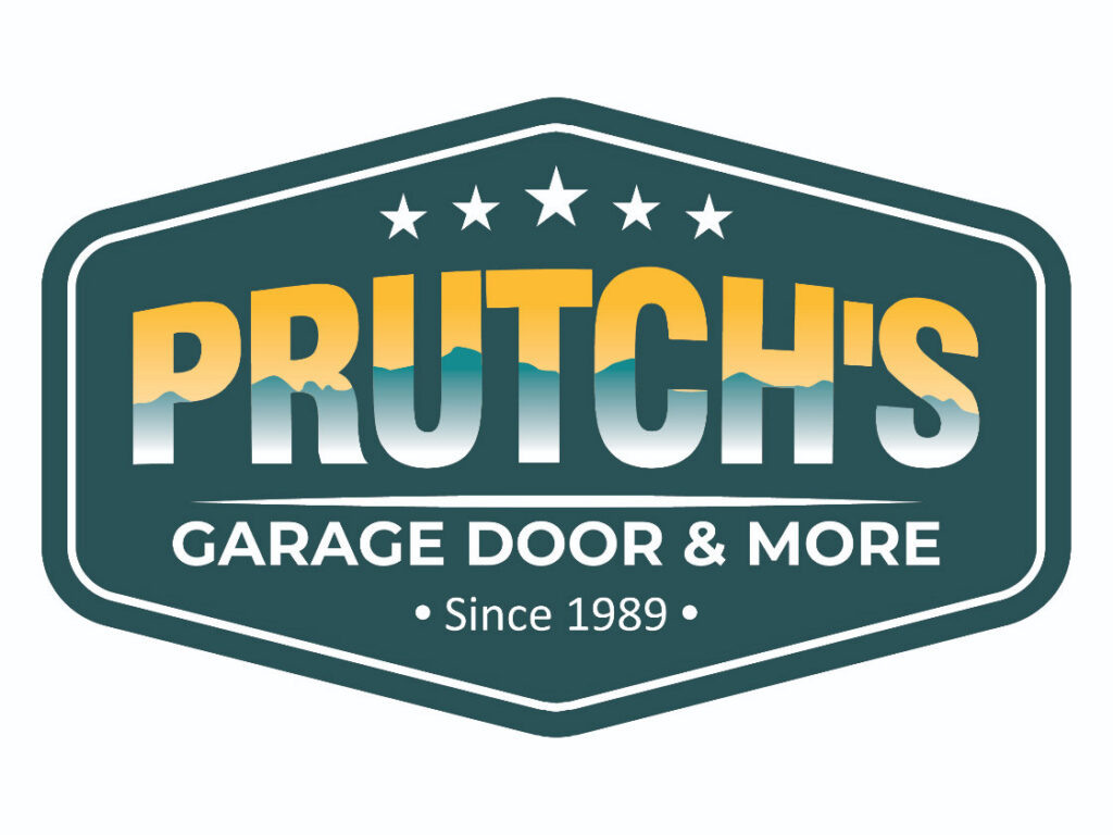 Interior view of a garage showing a newly installed white garage door and opener by Prutch's Garage Door in Page, AZ