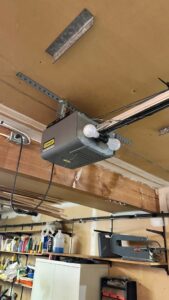 A Stanley garage door opener unit installed on the ceiling by AAA Garage Door Services in Renton, WA
