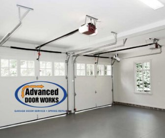 Interior view of garage door openers and tracks installed by Advanced Door Works in Highlands Ranch, CO
