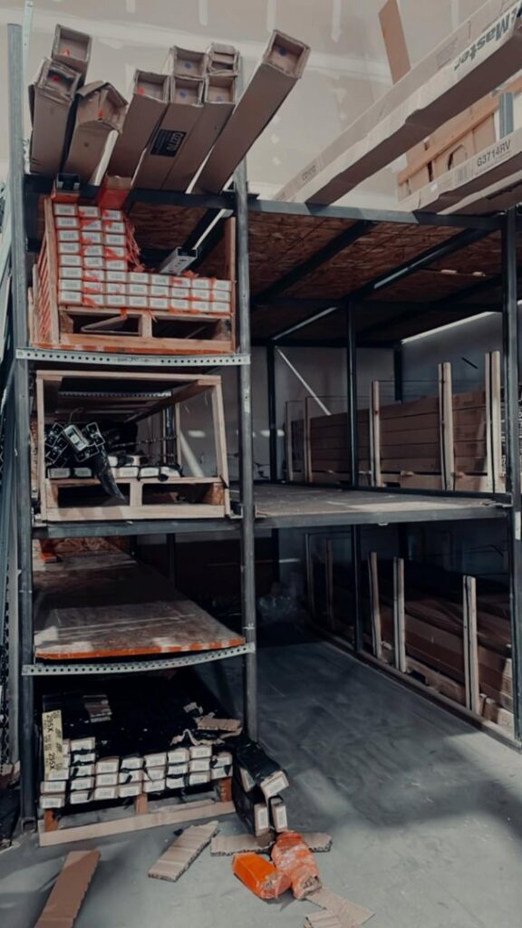 An organized storage area with various garage door parts and components for Greeley garage door repair in Greeley, CO.