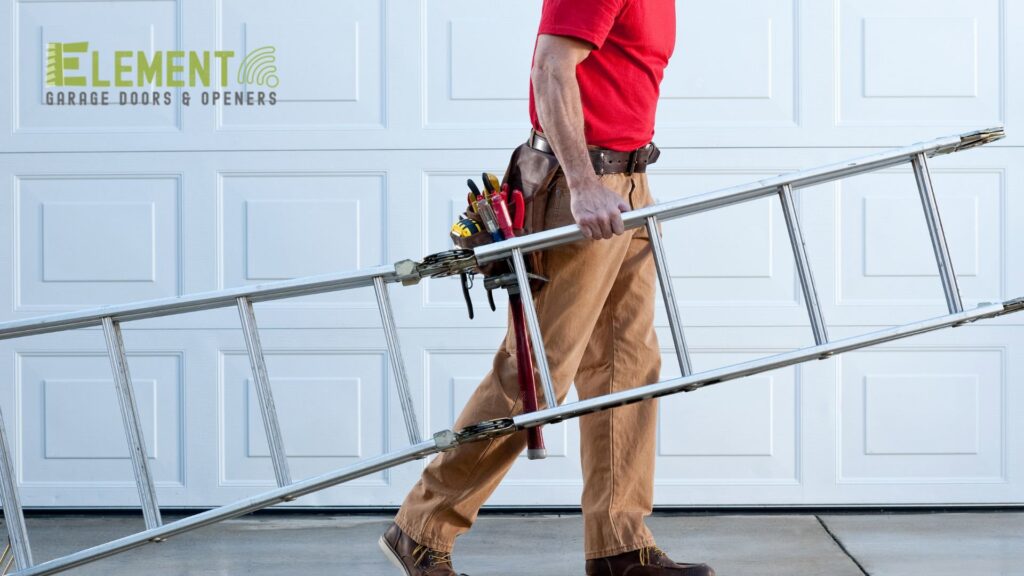 A garage door technician carrying a ladder, ready for service or installation by Element Garage Door Repair Of Portland, OR