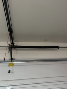 A newly installed or repaired garage door torsion spring by 4 Sons Garage Door in Phoenix, AZ.
