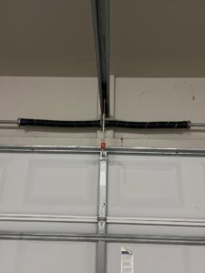 Close-up of a garage door torsion spring system installation by Specialty Garage Door in Bossier City, LA