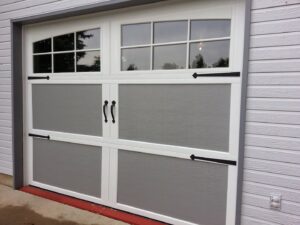 A close-up view of a garage door torsion spring system, serviced by American Eagle Garage Doors in Greeley, CO.