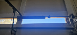 A close-up view of a garage door torsion spring system serviced by Skreno Services in Summerville, SC.