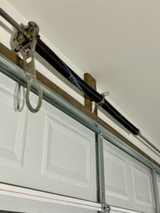 Close-up of a garage door torsion spring system serviced by Specialty Garage Door in Bossier City, LA