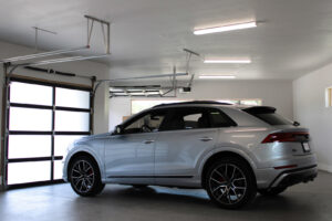 Bright fluorescent lighting installed in a modern garage by ACJ Electric LLC in North Babylon, NY.