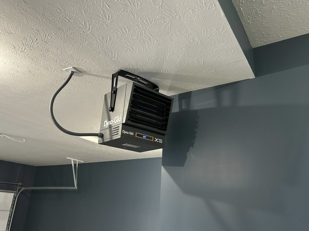 An electric garage heater professionally installed on a ceiling by Heritage Electric LLC in Indianapolis, IN.