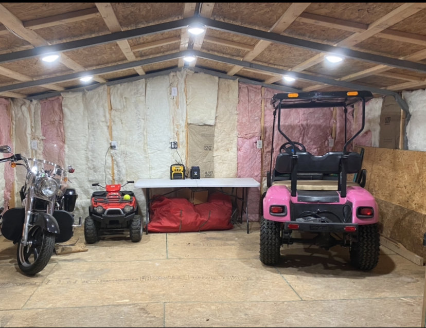 New interior lighting installed in a garage or workshop by Pierce Electric, LLC in Fayetteville, NC
