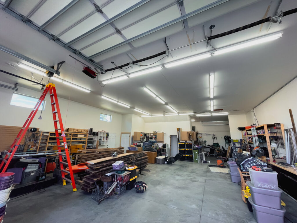 A garage with bright LED strip lighting installed by Tier 1 Electric, providing excellent illumination in Boise, ID.