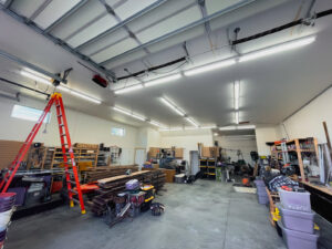 A garage with bright LED strip lighting installed by Tier 1 Electric, providing excellent illumination in Boise, ID.