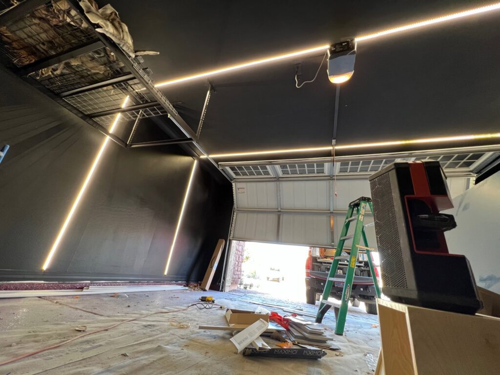 Modern LED strip lighting installed in a garage ceiling and walls by Gilmore Electrical in Saint Louis, MO