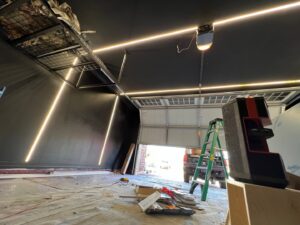 Modern LED strip lighting installed in a garage ceiling and walls by Gilmore Electrical in Saint Louis, MO