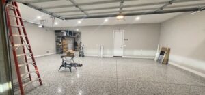 A newly installed recessed lighting system in a garage by Johnson Power and Air in Gilbert, AZ.