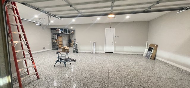 A newly installed recessed lighting system in a garage by Johnson Power and Air in Gilbert, AZ.