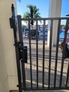 Gate latch with wiring for an access control system installed by Wirenut Technologies LLC in Brandon, FL.