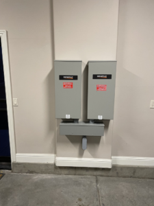 Two Generac electrical panels and transfer switches installed by Almighty Electric, Inc. in Yuma, AZ.