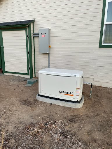 A Generac generator and outdoor electrical panel installation by Almighty Electric, Inc. in Yuma, AZ.