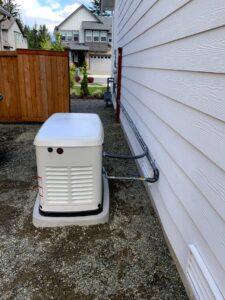 A Generac generator installed with gas line connections by Washington Generators LLC in Kent, WA.