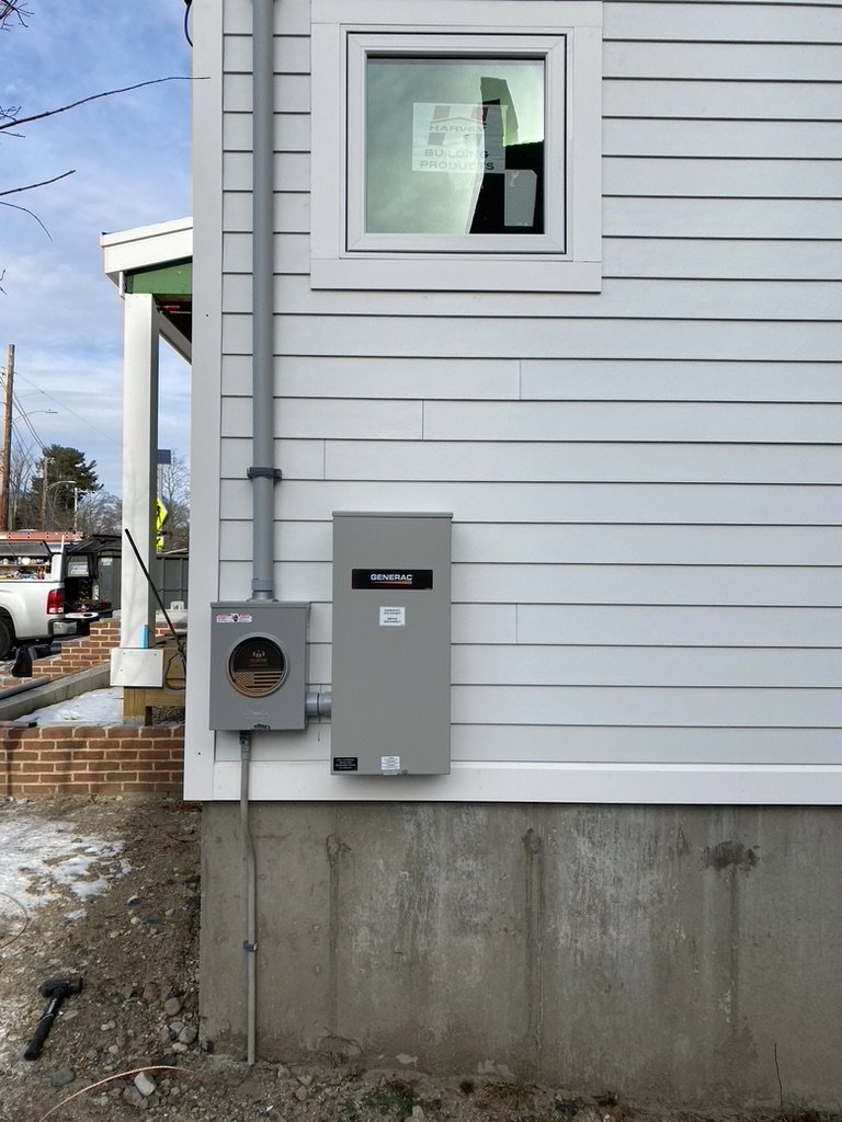Generac whole-home generator installation and electrical meter by Empower Electrical, LLC in Fall River, MA